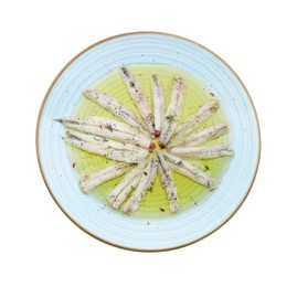 Photo of Tasty pickled anchovies with spices isolated on white, top view