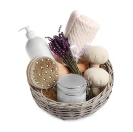 Photo of Spa gift set of different luxury products in wicker basket on white background