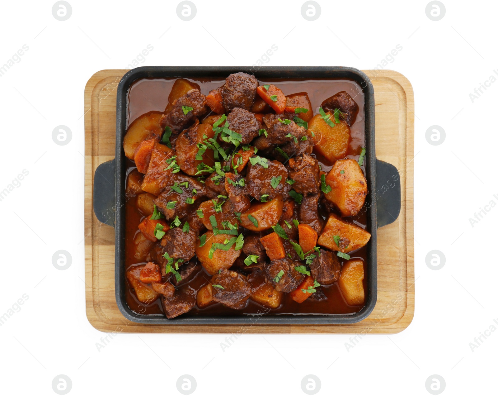 Photo of Delicious beef stew with carrots, parsley and potatoes on white background, top view