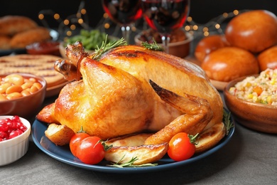 Traditional festive dinner with delicious roasted turkey served on table