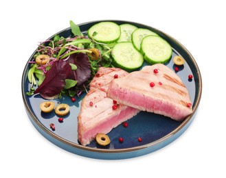 Photo of Pieces of delicious tuna steak with olives, salad and cucumbers on white background