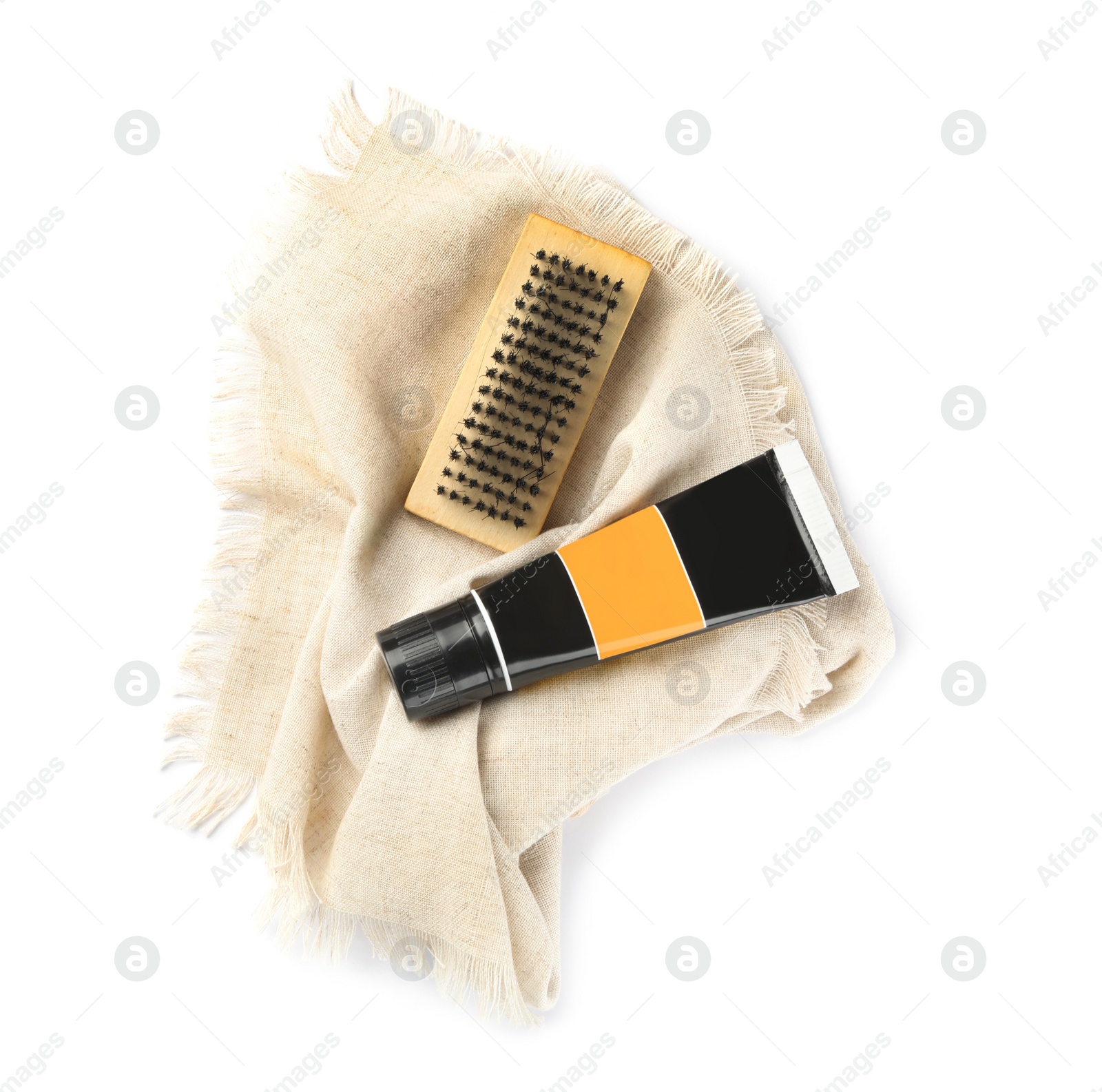 Photo of Set of shoe care products on white background, top view