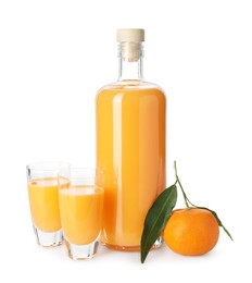 Tasty tangerine liqueur and fresh fruit isolated on white