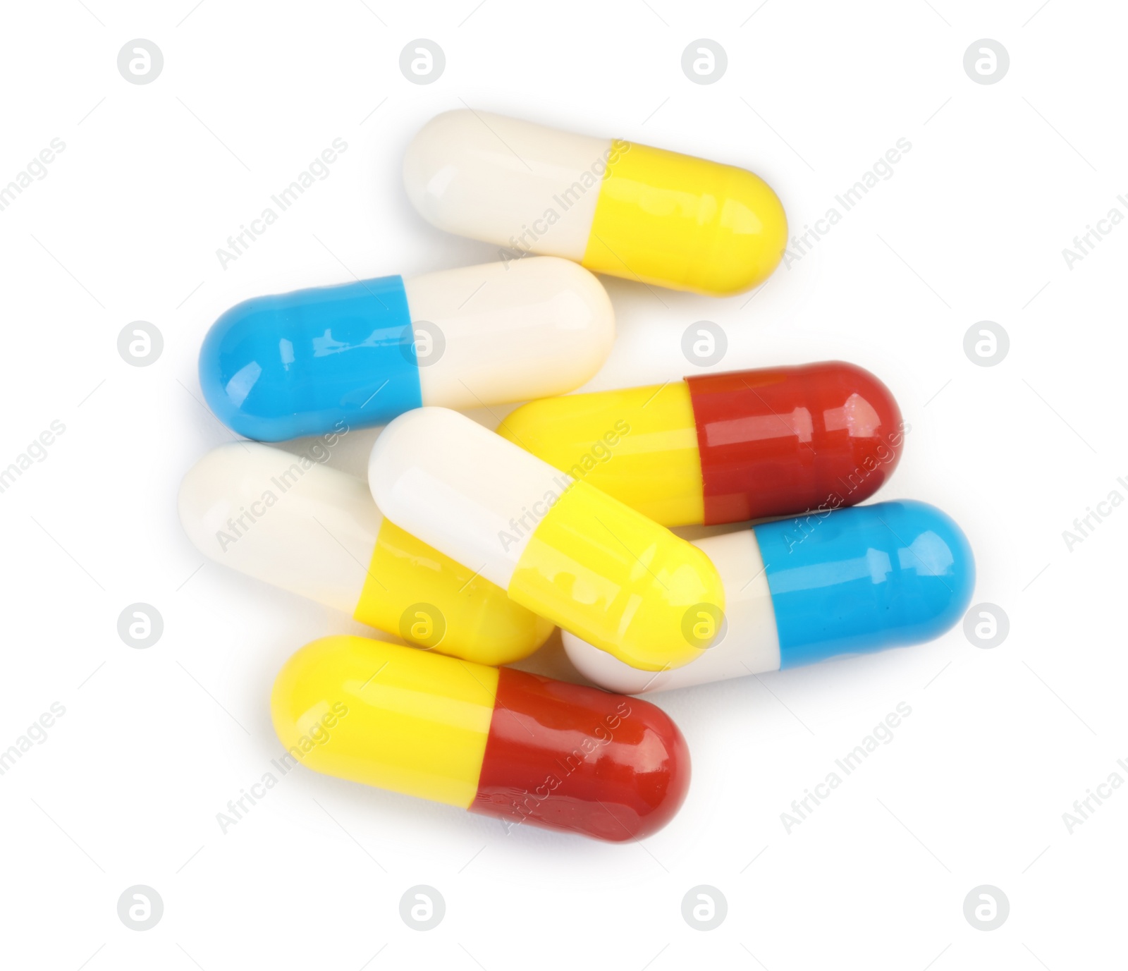 Photo of Many antibiotic pills isolated on white, top view