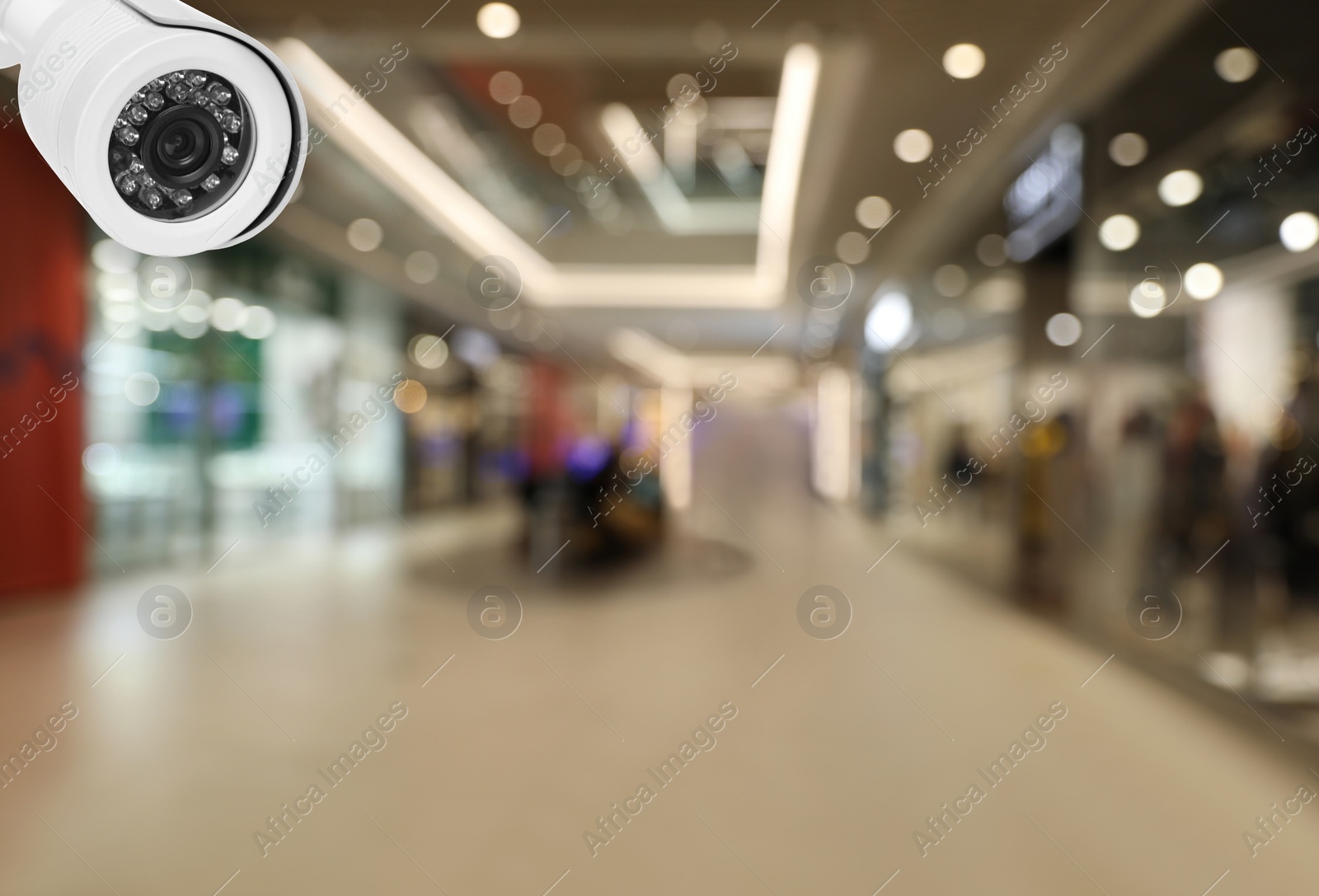 Image of Modern CCTV security camera in shopping mall. Guard equipment