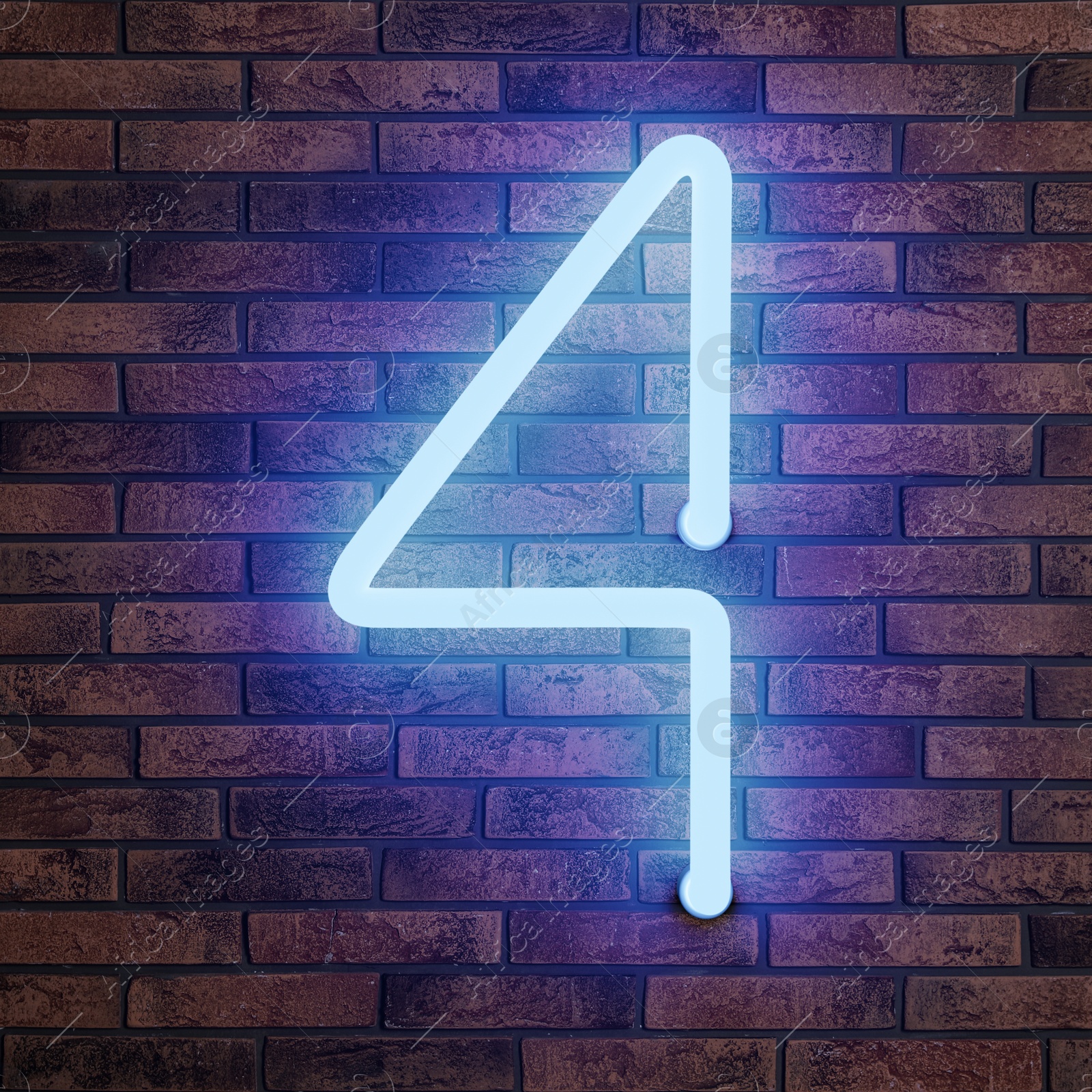 Image of Glowing neon number 4 sign on brick wall