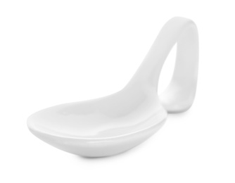 Photo of Clean empty ceramic appetizer spoon on white background