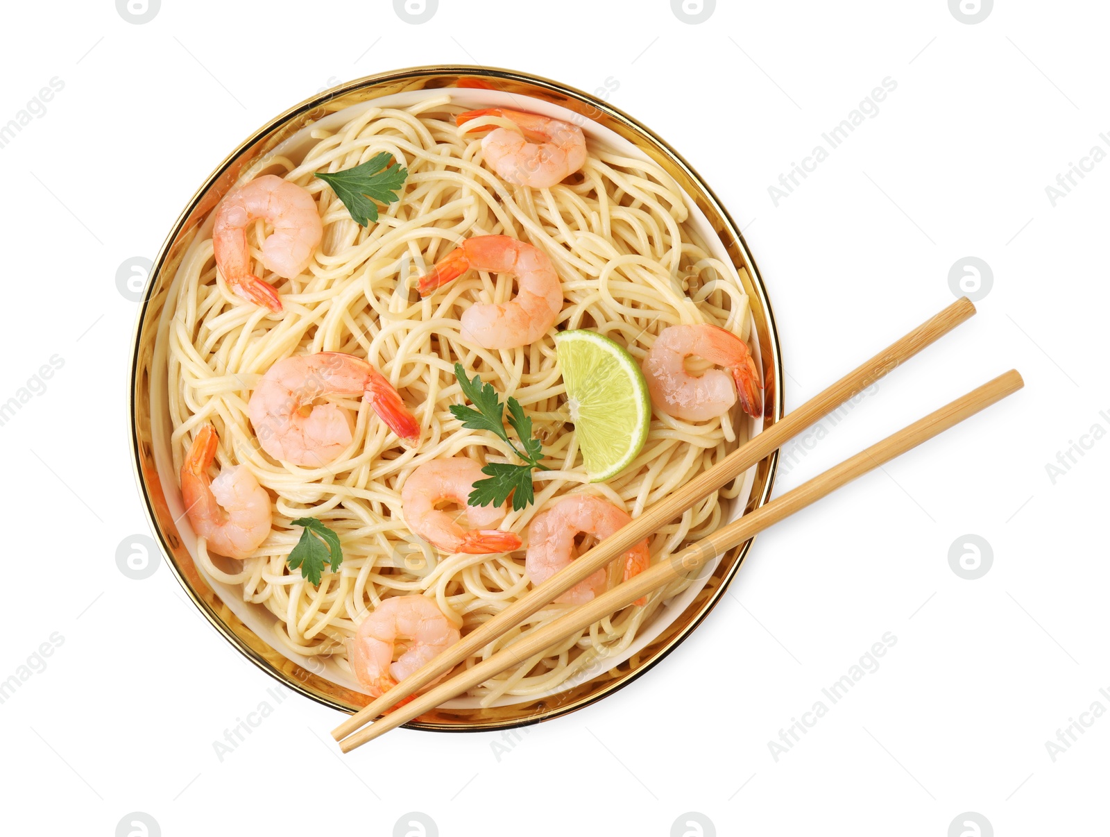 Photo of Tasty spaghetti with shrimps, lime and parsley in bowl isolated on white, top view