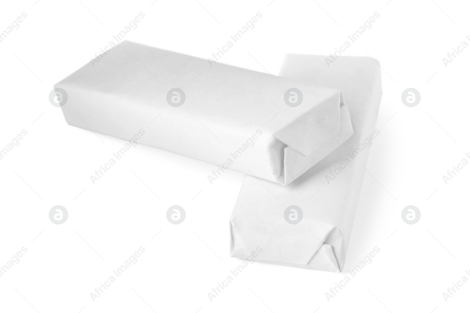 Photo of Packs of chewing gums on white background