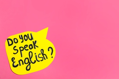 Paper speech bubble with question Do You Speak English on pink background, top view. Space for text