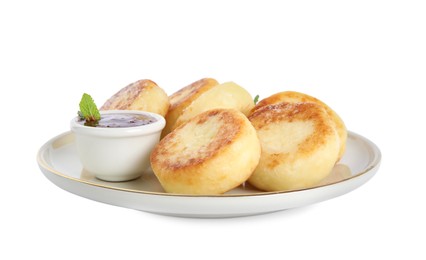 Photo of Delicious cottage cheese pancakes with jam and icing sugar isolated on white