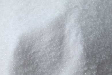 Photo of Organic white sea salt as background, above view