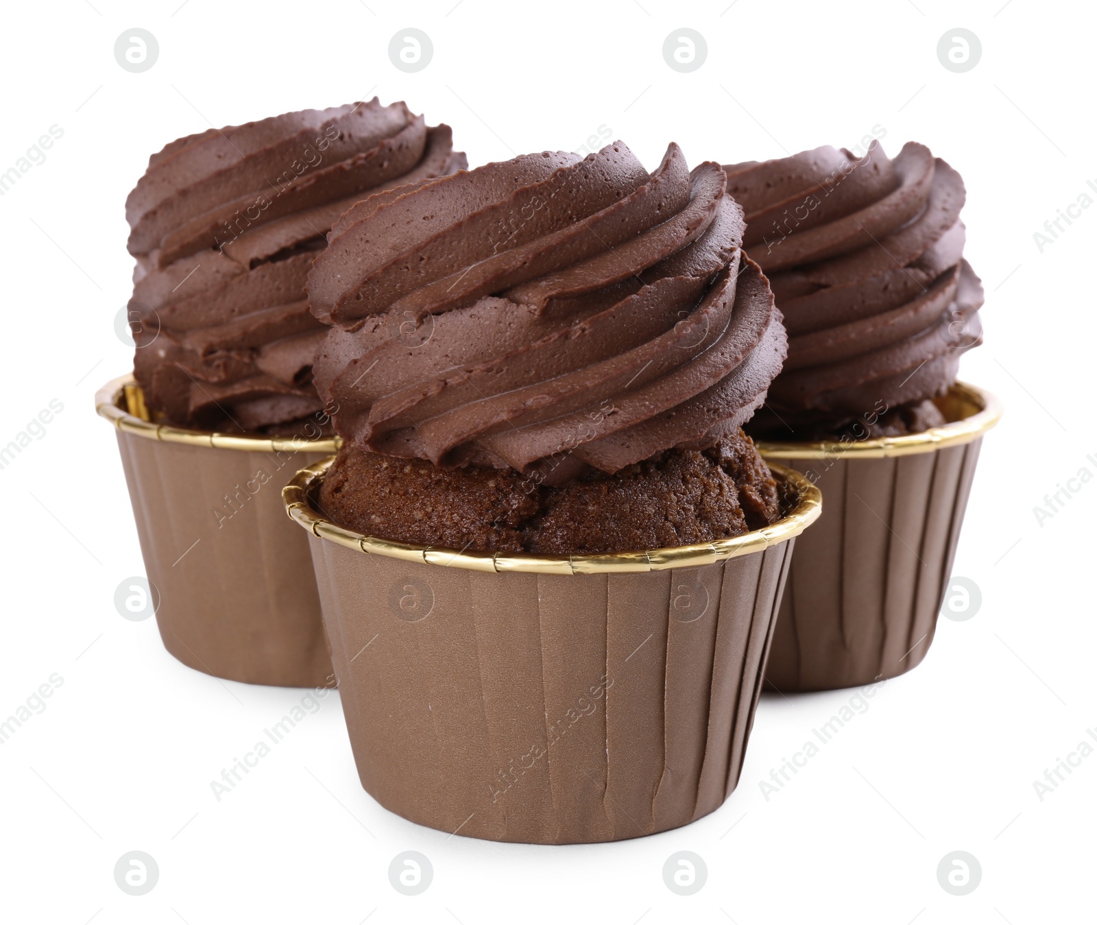 Photo of Three delicious chocolate cupcakes isolated on white