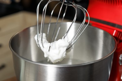 Photo of Modern stand mixer in kitchen, closeup. Home appliance