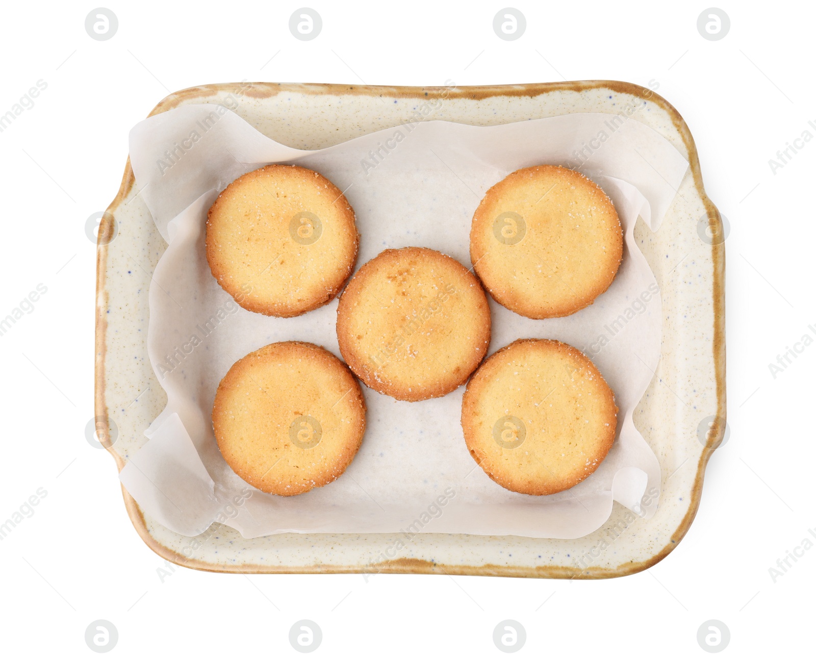 Photo of Tasty sweet sugar cookies in baking dish isolated on white, top view