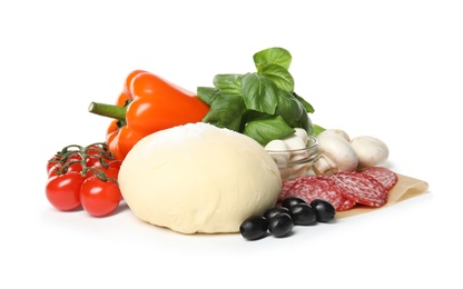 Composition with dough and fresh ingredients for pizza isolated on white