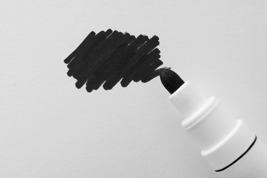 Photo of Stroke drawn with black marker and highlighter isolated on white, top view