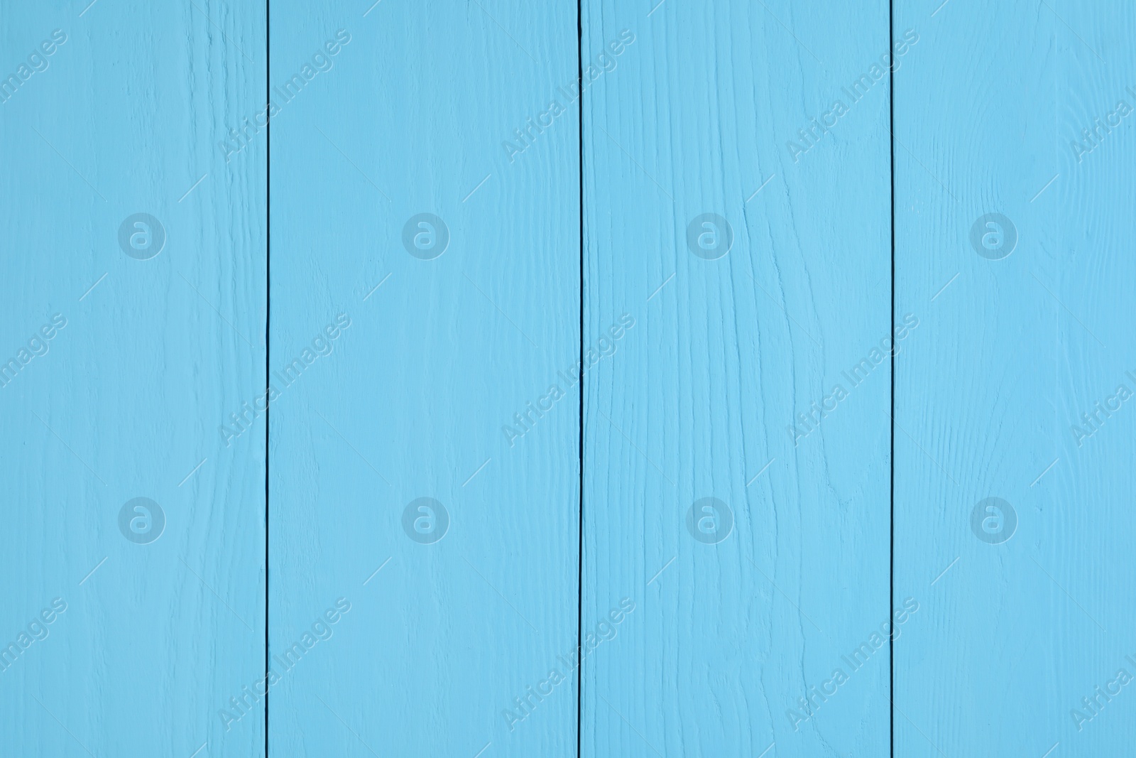 Photo of Texture of light blue wooden surface as background, closeup