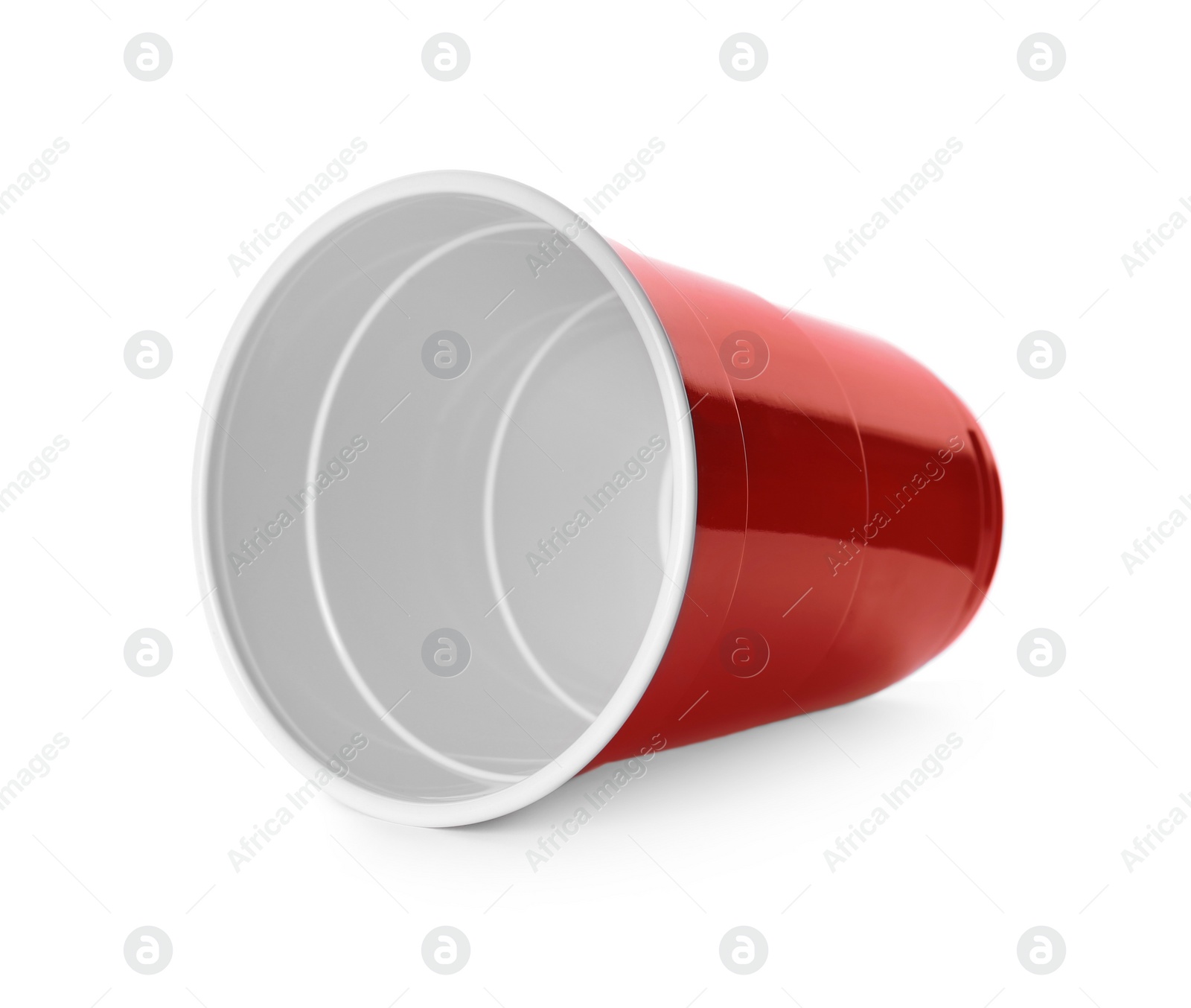 Photo of Red plastic cup isolated on white. Beer pong game