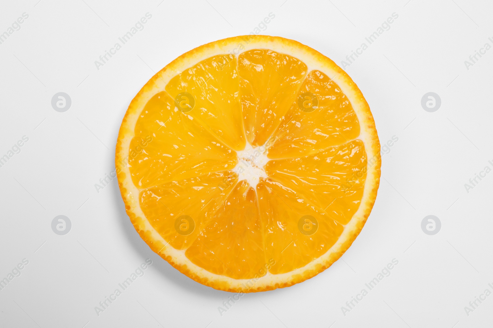 Photo of Slice of juicy orange on white background, top view