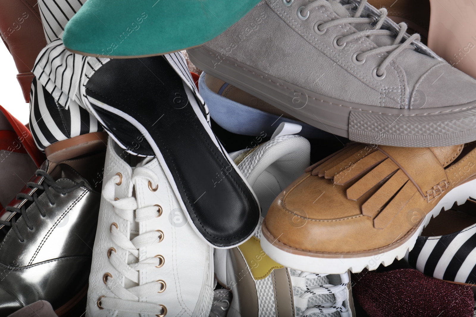 Photo of Different colorful female shoes as background, closeup