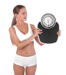 Photo of Slim woman with scale on white background. Healthy diet