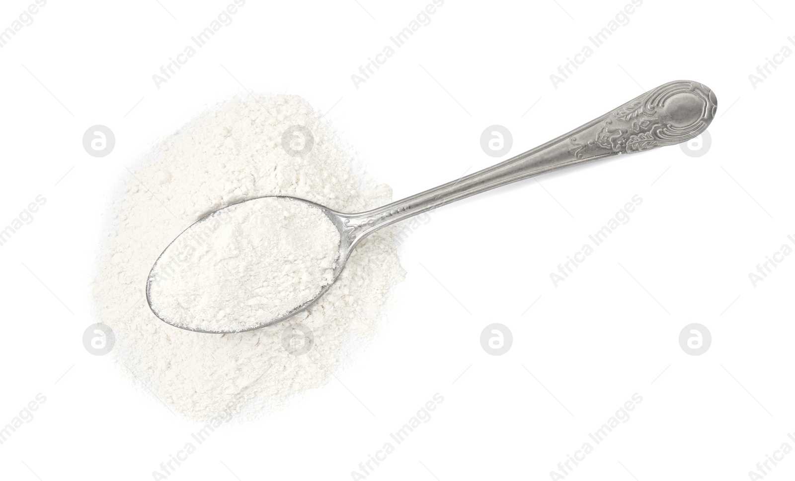 Photo of Baking powder in spoon isolated on white, top view