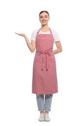 Photo of Beautiful young woman in clean striped apron on white background