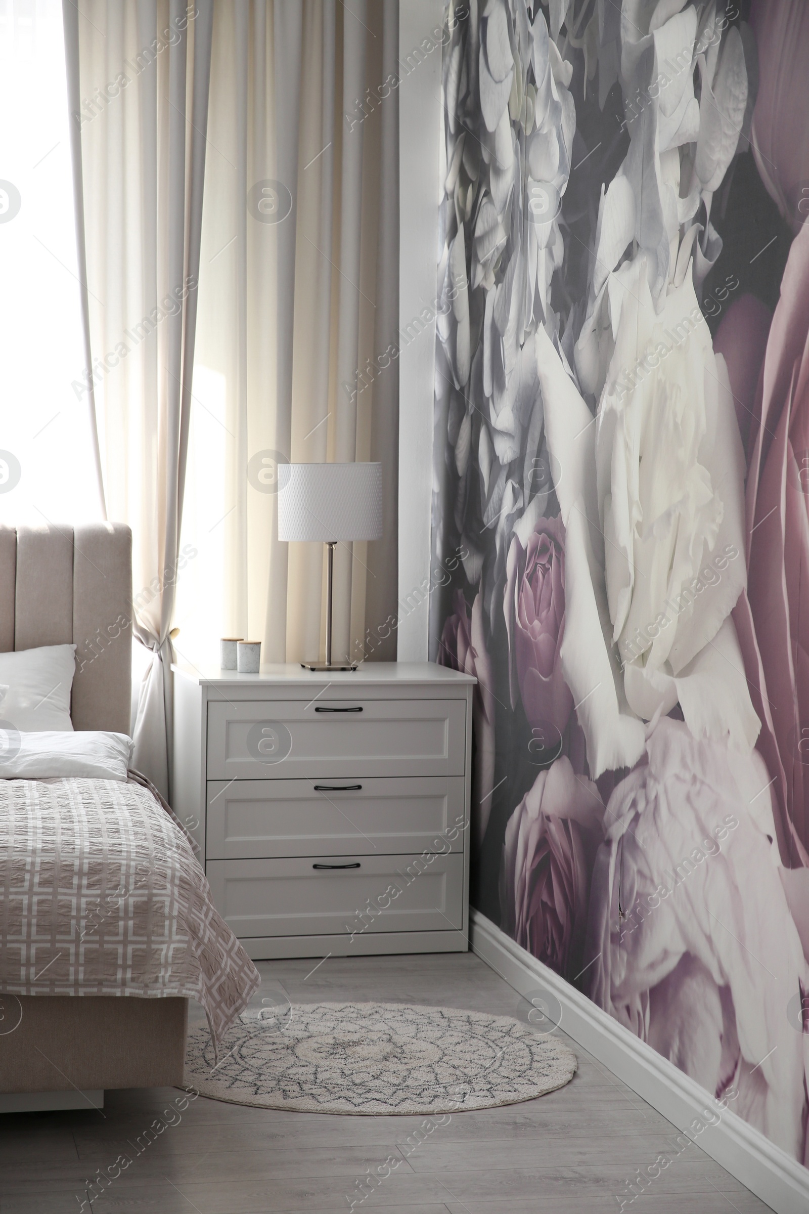 Photo of Beautiful floral photoart work used as wallpaper in bedroom interior