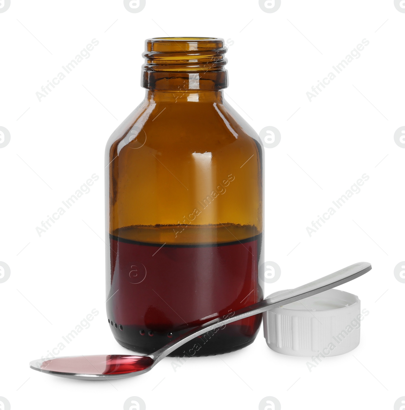 Photo of Bottle of cough syrup and spoon on white background