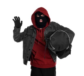 Photo of Emotional thief in balaclava with bag on white background