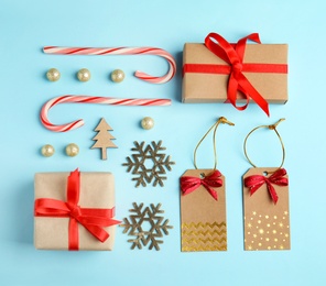 Flat lay composition with Christmas decor on blue background