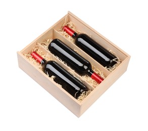 Wooden gift box with wine bottles isolated on white