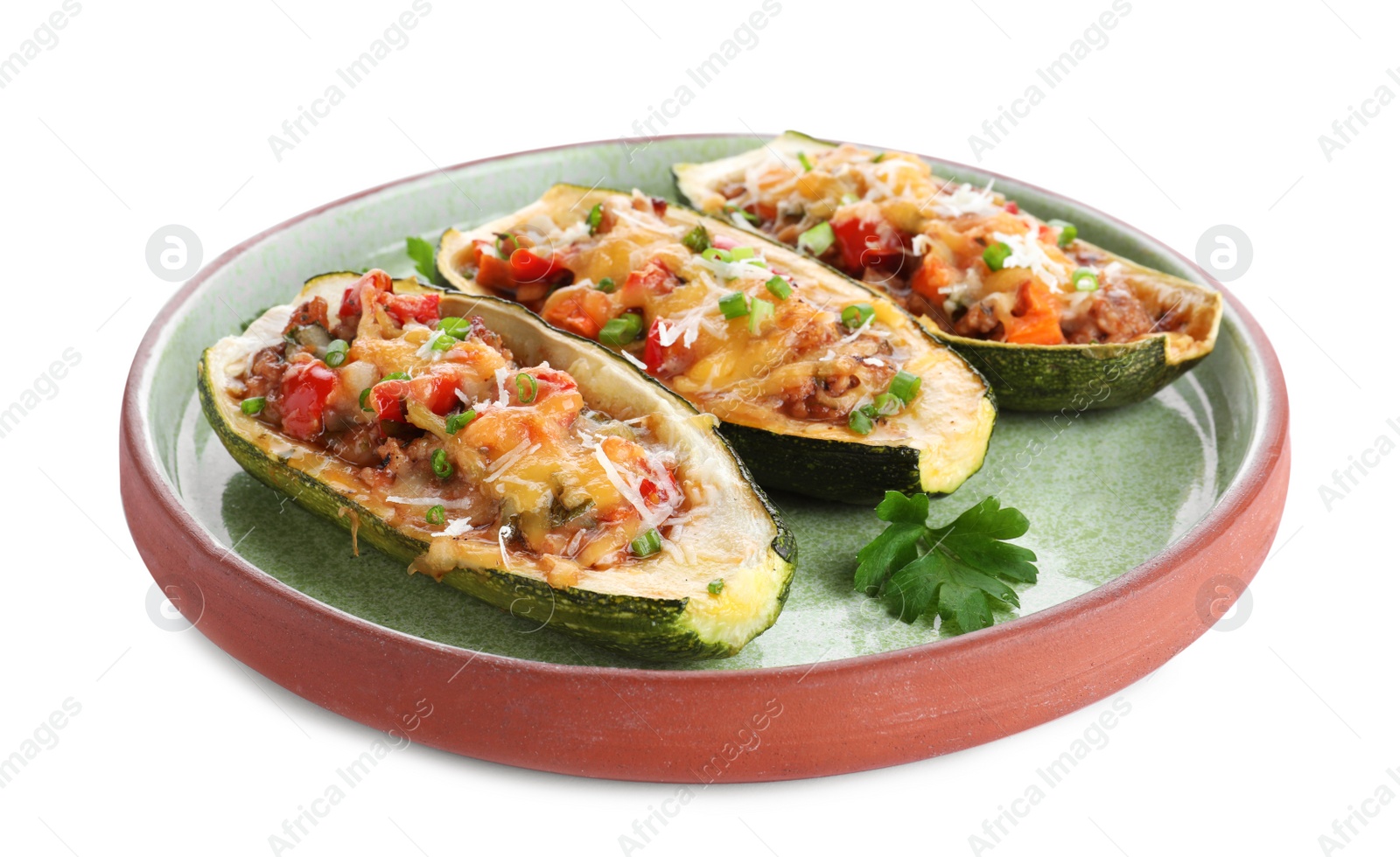 Photo of Plate of delicious stuffed zucchini on white background