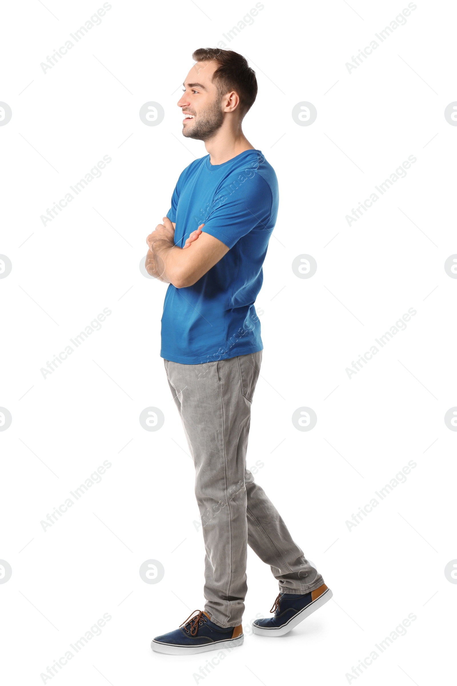 Photo of Full length portrait of handsome man posing on white background