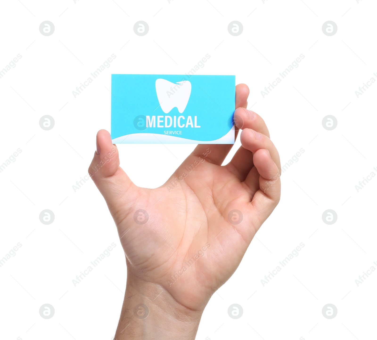 Photo of Man holding business card isolated on white, closeup. Dental medical service