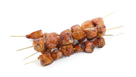 Photo of Delicious shish kebabs isolated on white, above view