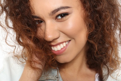 Photo of Portrait of young African-American woman with beautiful face, closeup