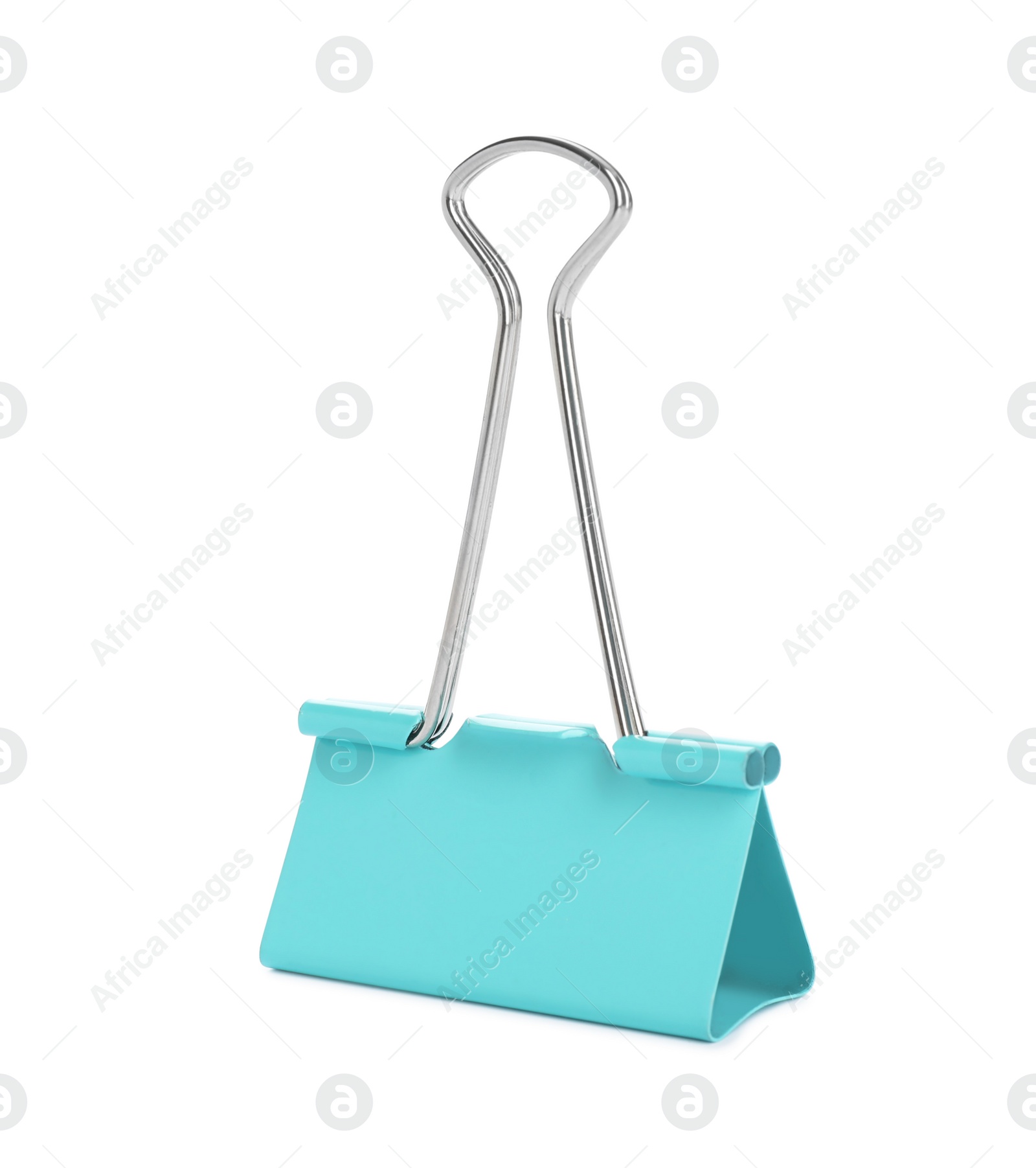 Photo of Turquoise binder clip isolated on white. Stationery