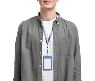 Photo of Smiling man with empty badge on white background, closeup
