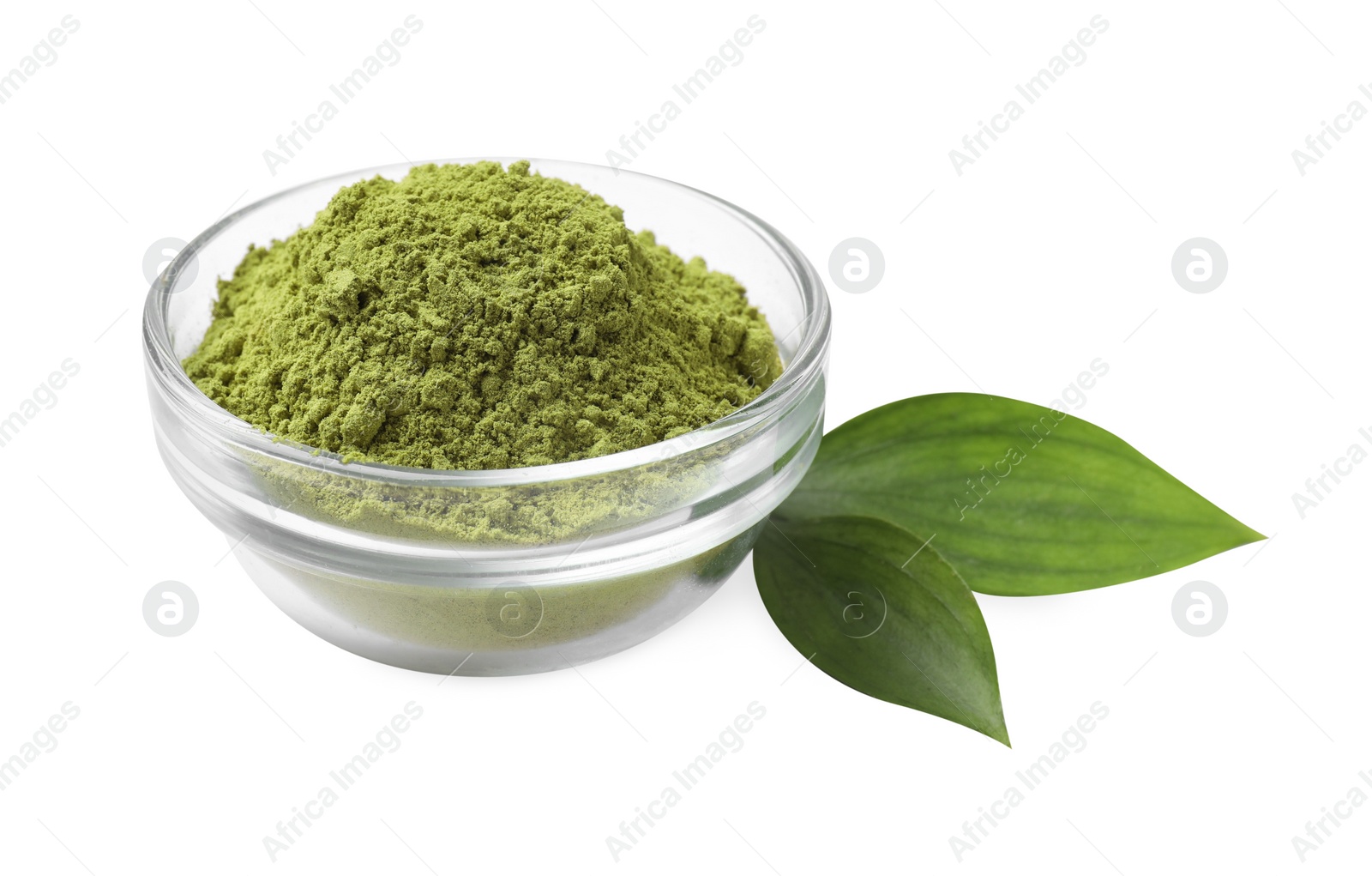 Photo of Henna powder in bowl and green leaves isolated on white