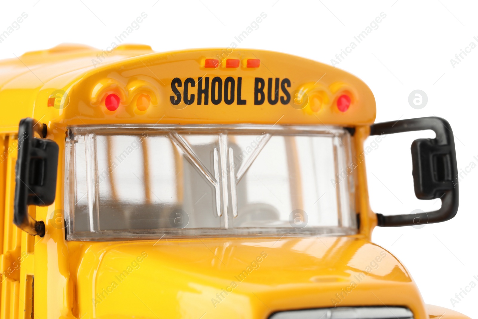 Photo of Yellow school bus on white background, closeup. Transport for students