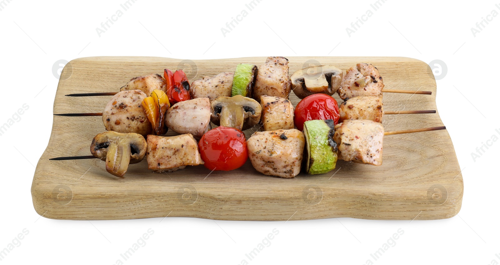 Photo of Wooden board with delicious shish kebabs and grilled vegetables isolated on white