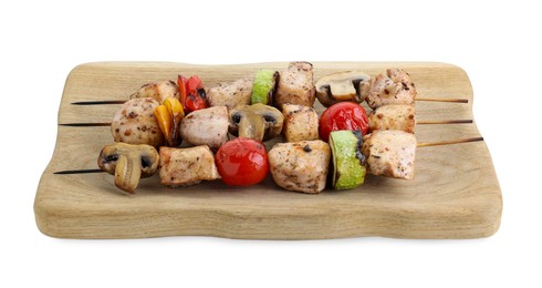 Photo of Wooden board with delicious shish kebabs and grilled vegetables isolated on white