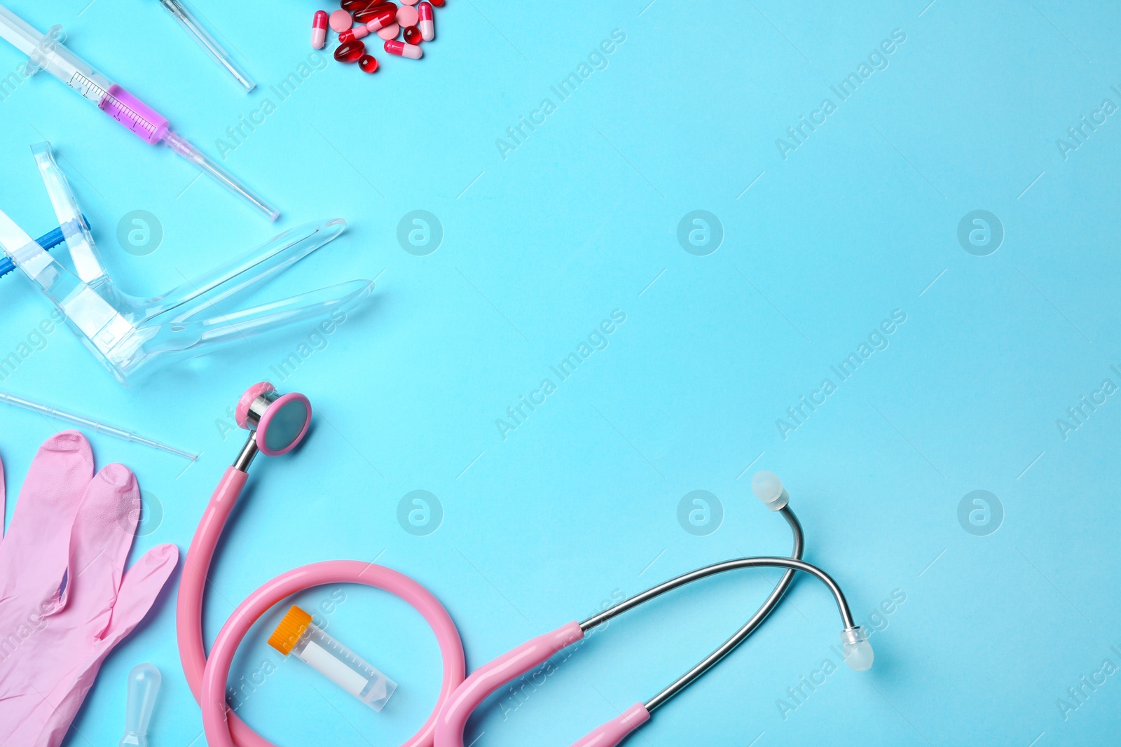 Photo of Flat lay composition with different medical objects and space for text on color background