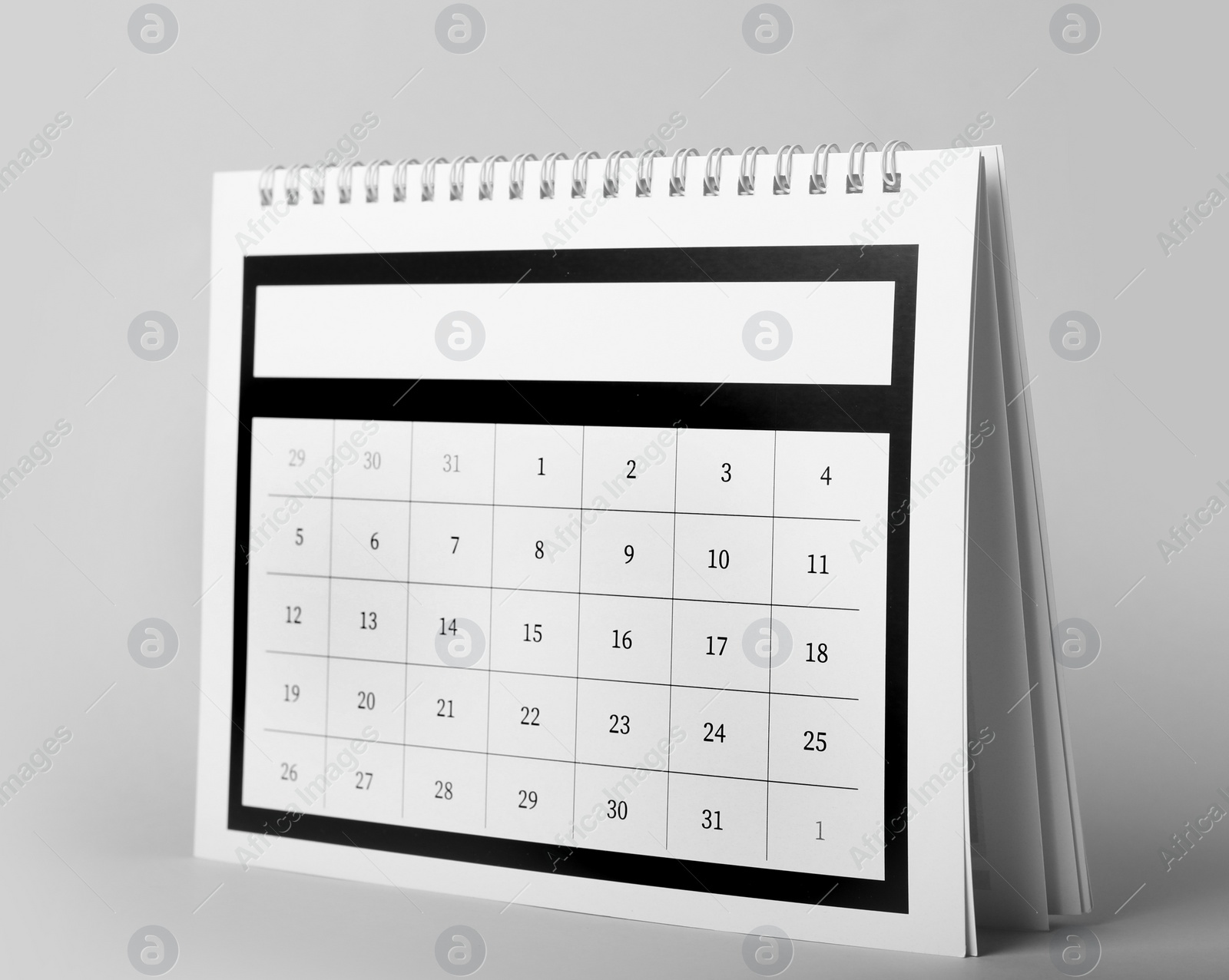 Photo of Paper calendar on grey background. Planning concept