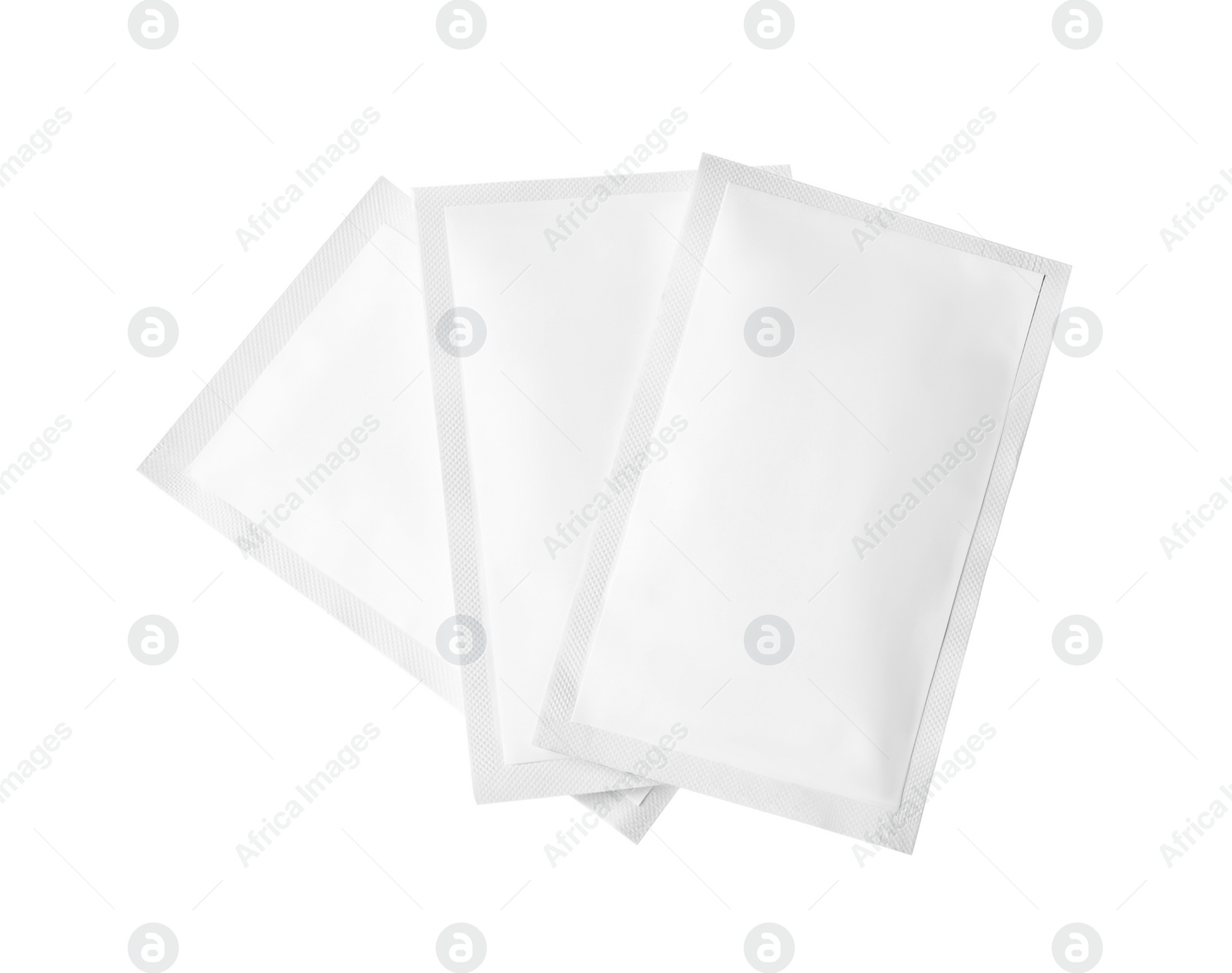 Photo of Three sachets on white background. Single use package