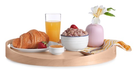 Photo of Wooden tray with delicious breakfast and beautiful flower on white background