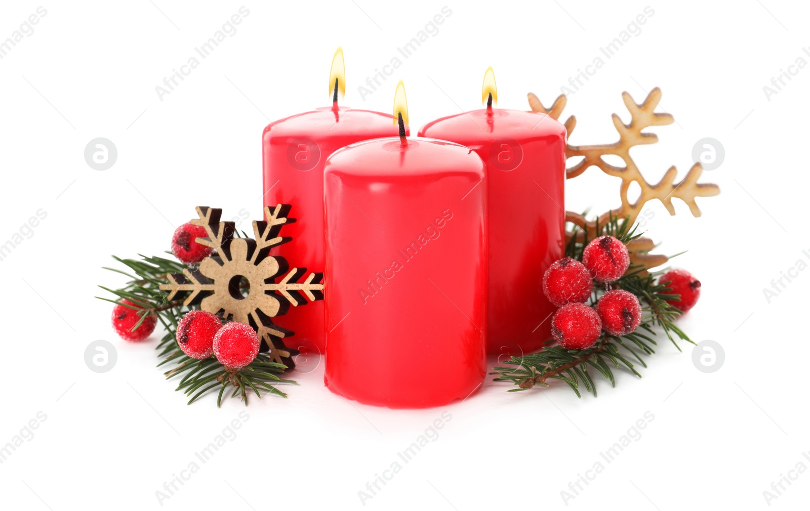 Photo of Burning red candles with Christmas decor isolated on white