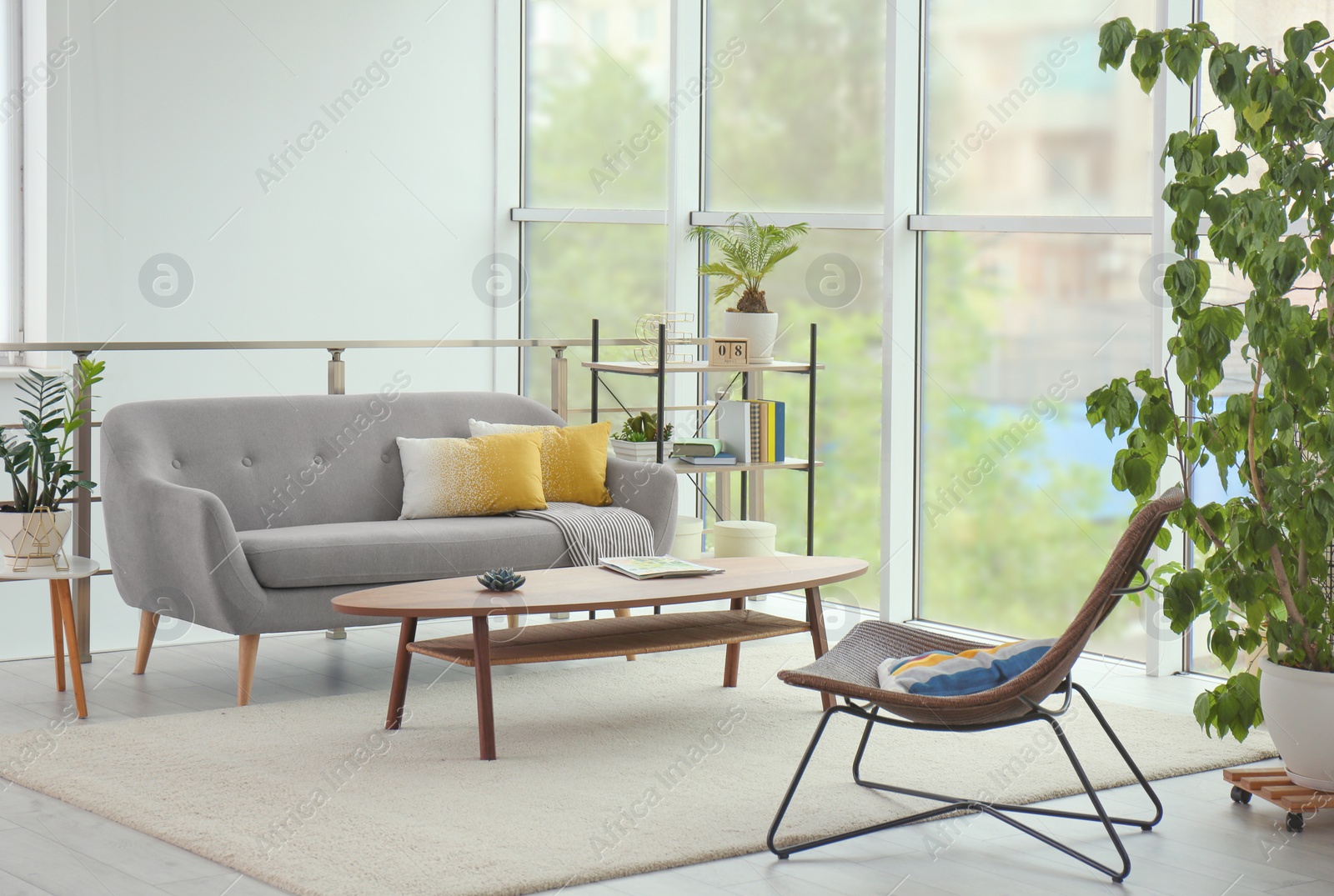 Photo of Elegant living room interior with comfortable sofa and coffee table